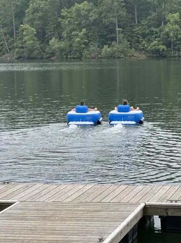 Two JetStream Lounger X2 units cruising side by side away from a dock
