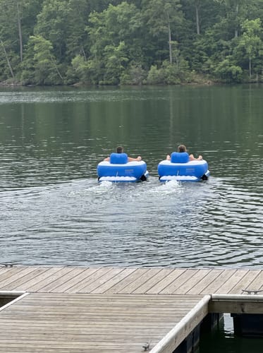 Two JetStream Lounger X2 units cruising side by side away from a dock